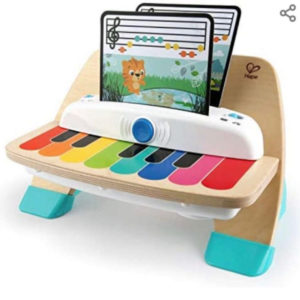 Magic Touch Piano Musikspielzeug Klavier aus Holz, mit 3 Notenblättern und 6 Liedern ( Amazon Prime)