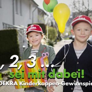 Gewinnspiel: Signalrote Kinderkappen für die Schul-/Kindergartenkinder und kostenlose Broschüren von DEKRA