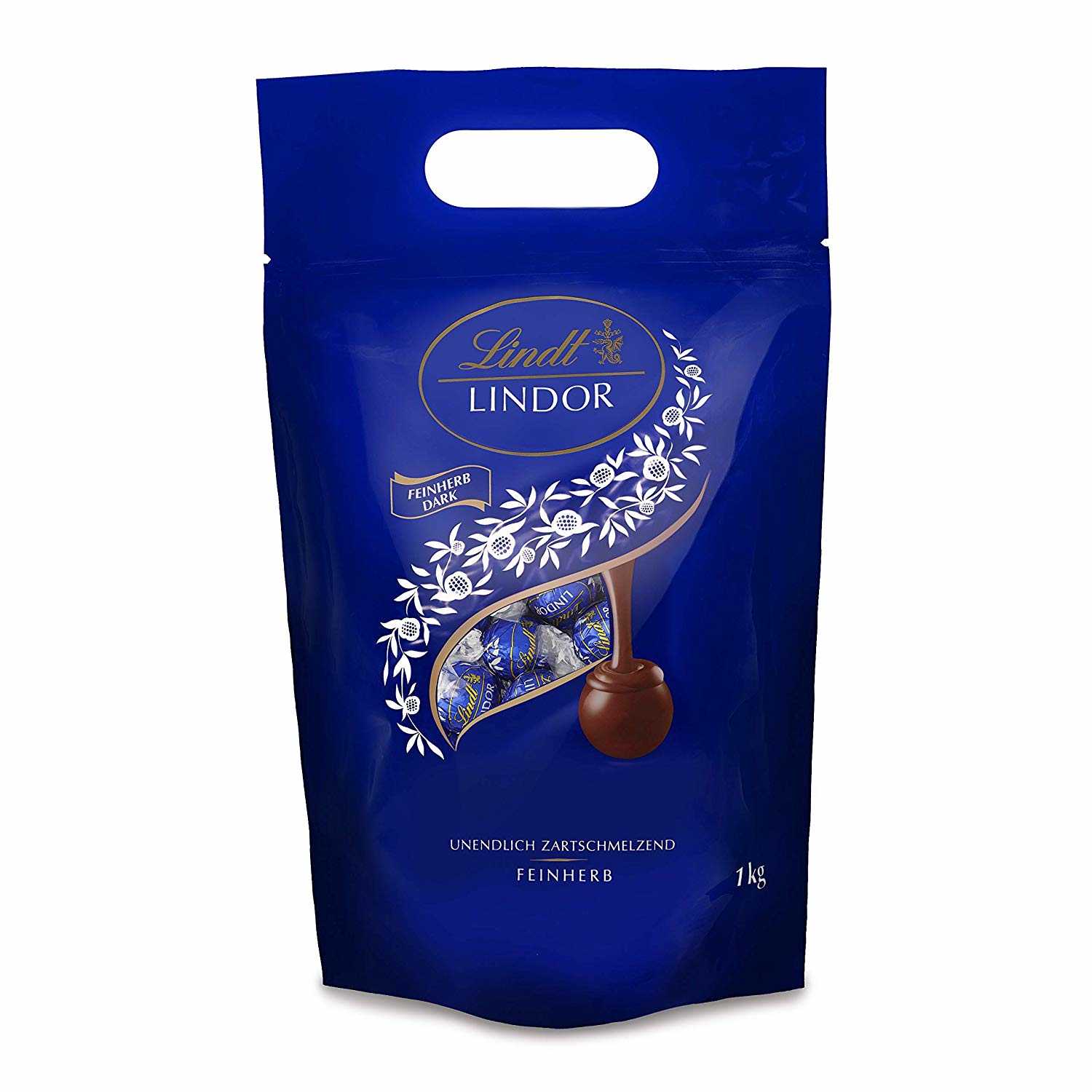 Линдт. Конфеты Lindt Nuxor Milk. Lindt с кулоном.